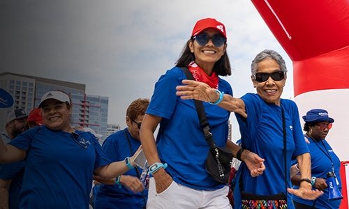 Employees and community members celebrating at Heart Walk event