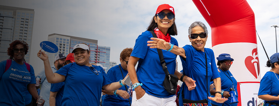 Employees and community members celebrating at Heart Walk event