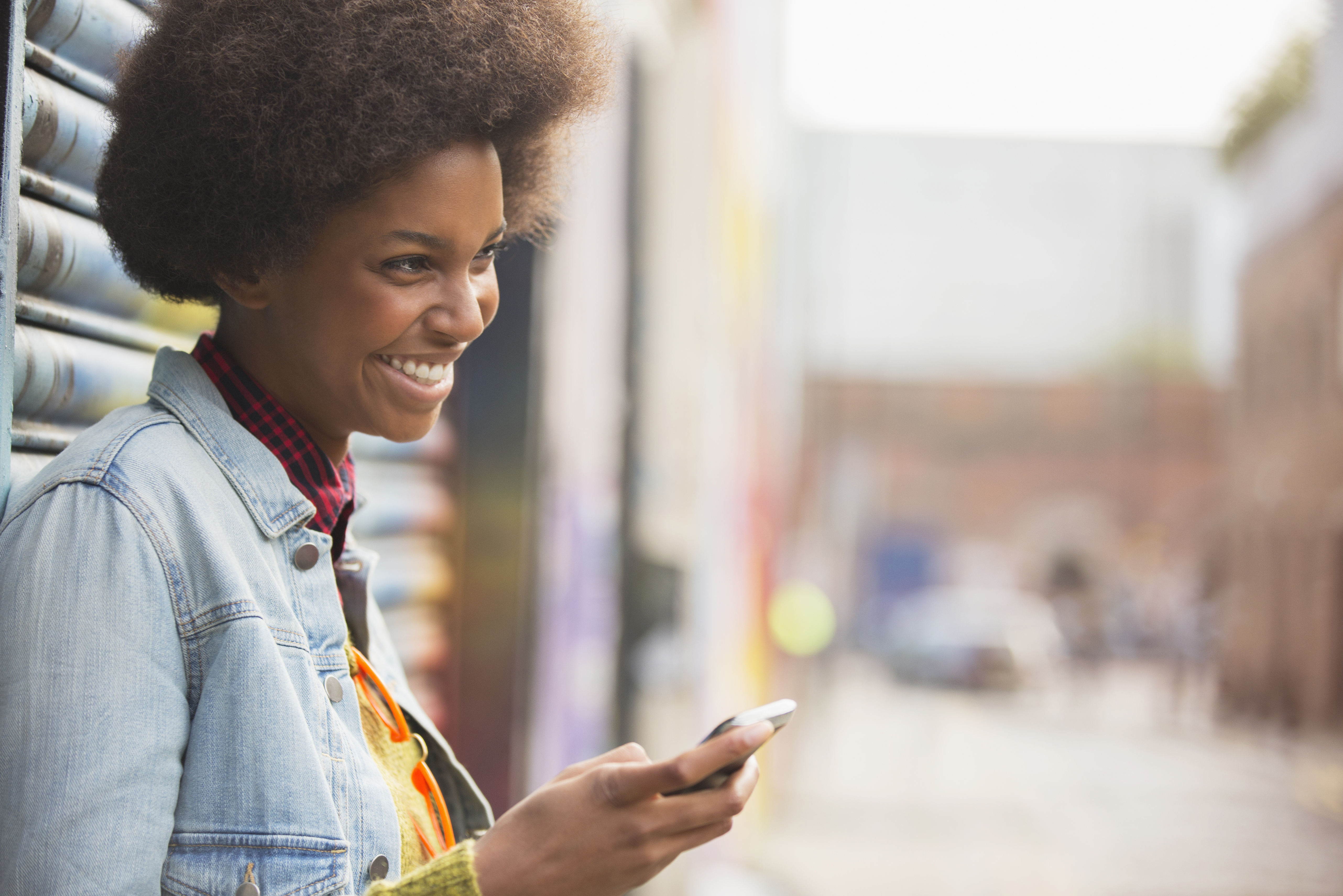 Woman uses mobile phone